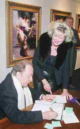 Pino signing for fan.jpg